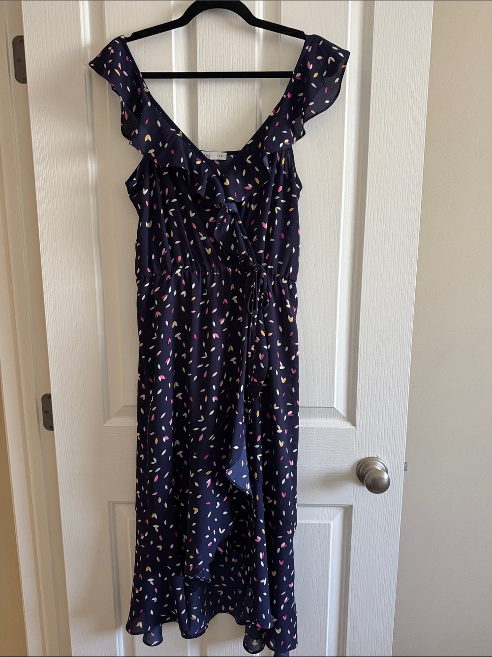 Navy Ruffle Wrap Dress with Pastels Confetti Print!